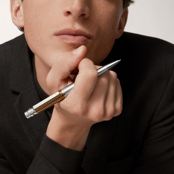 Santos de Cartier pen Large model, brushed and engraved striated metal covered with amber brown PVD, palladium finish
