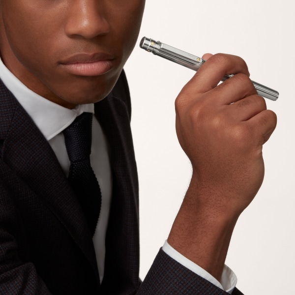 Santos de Cartier rollerball pen Large model, engraved metal, palladium and gold finishes