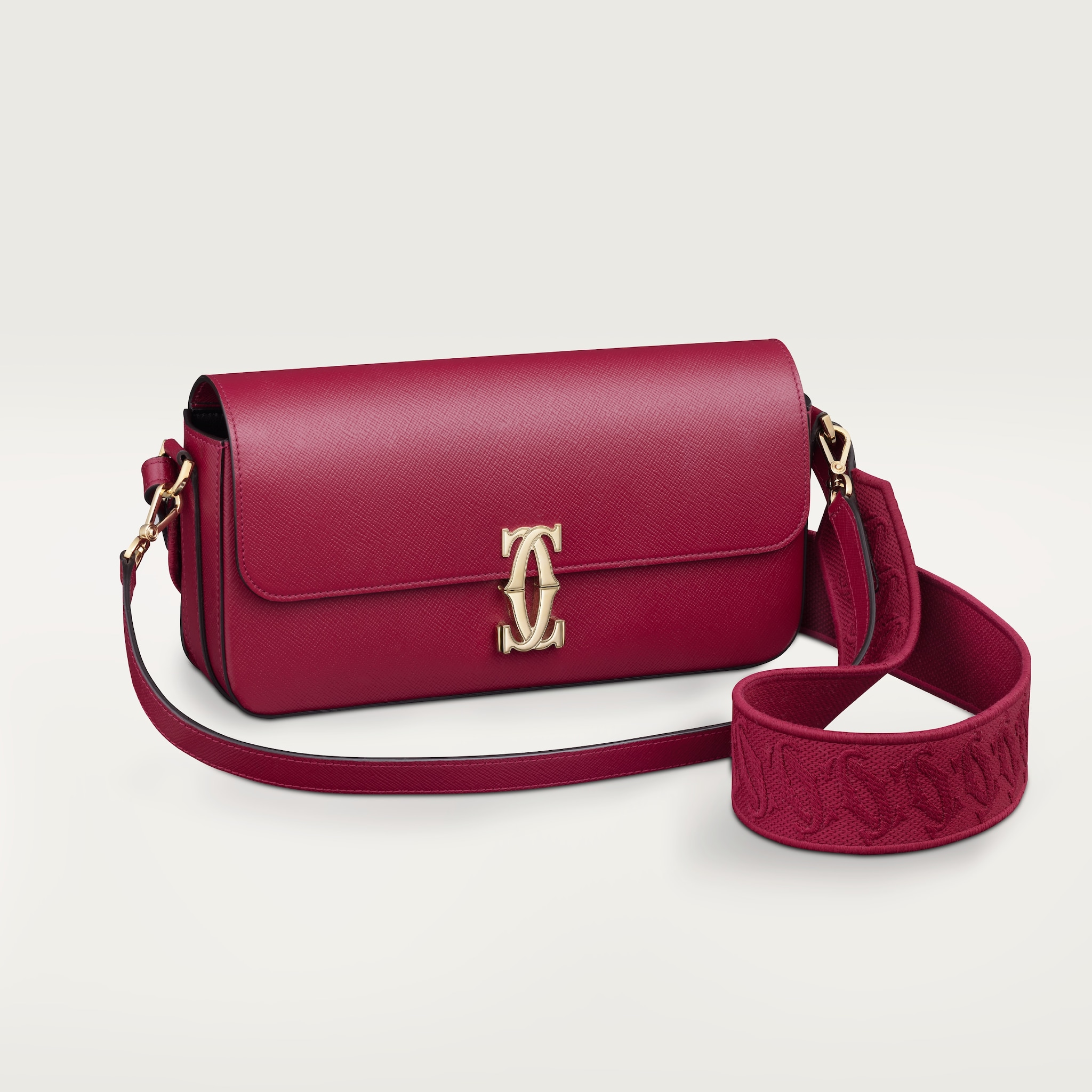 C de Cartier east-west bagCherry red textured calfskin, embroidery, golden finish