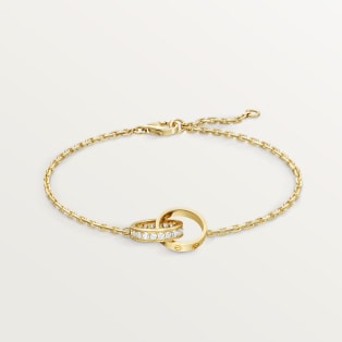 <span class='lovefont'>A </span> bracelet, on chain, semi-paved Yellow gold, diamonds