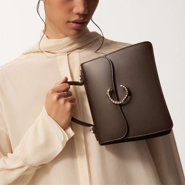 Top handle bag small model, Panthère de Cartier Tonka brown calfskin, palladium finish, zebra motif