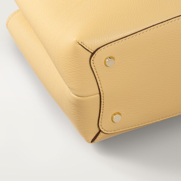 Small model handle bag, Panthère Double de Cartier Mimosa yellow calfskin, golden finish
