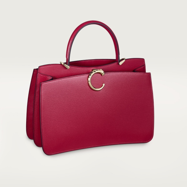 Top handle bag small model, Panthère de Cartier Cherry red calfskin, golden finish