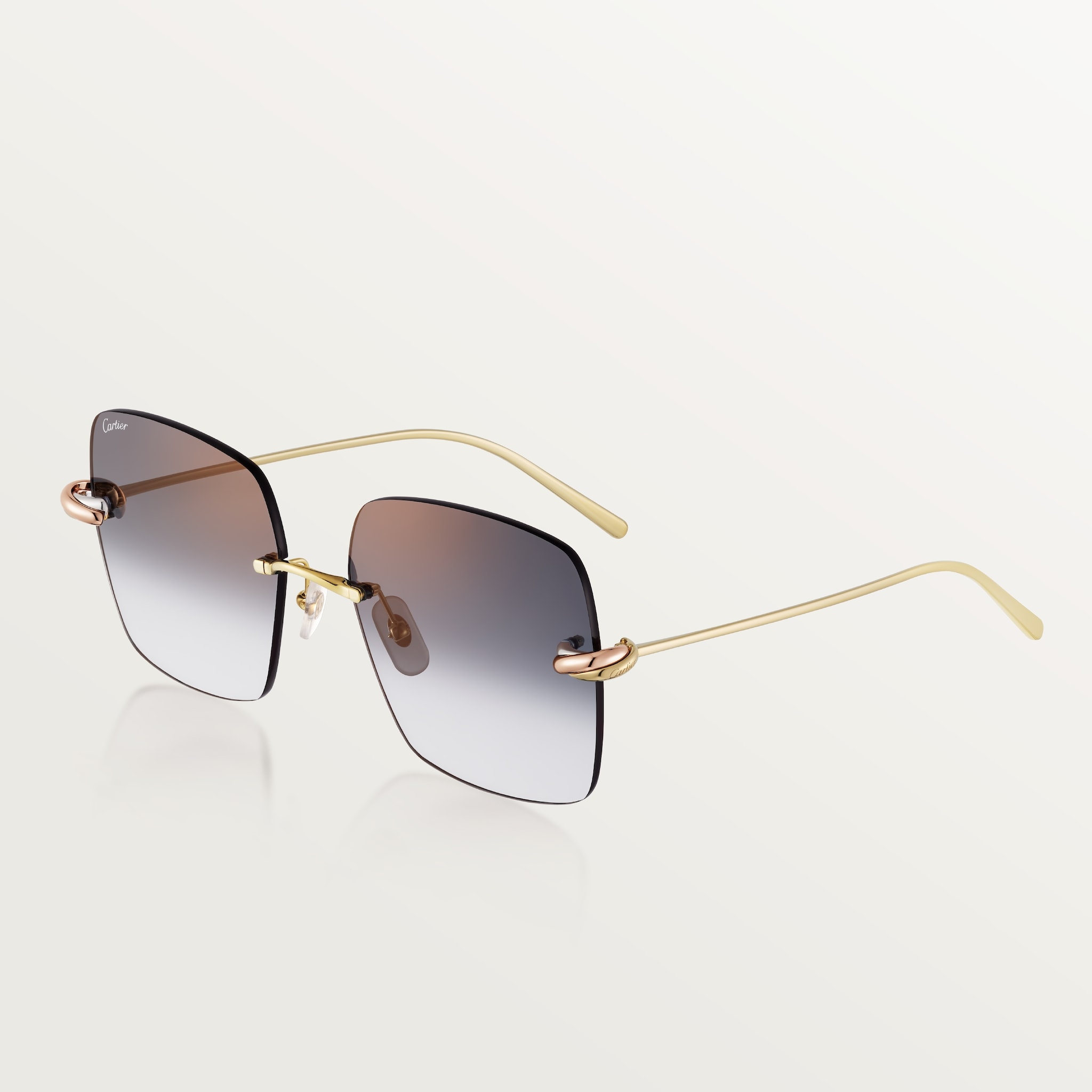 Trinity, SunglassesBlack metal, smooth three-tone golden finish, grey lenses