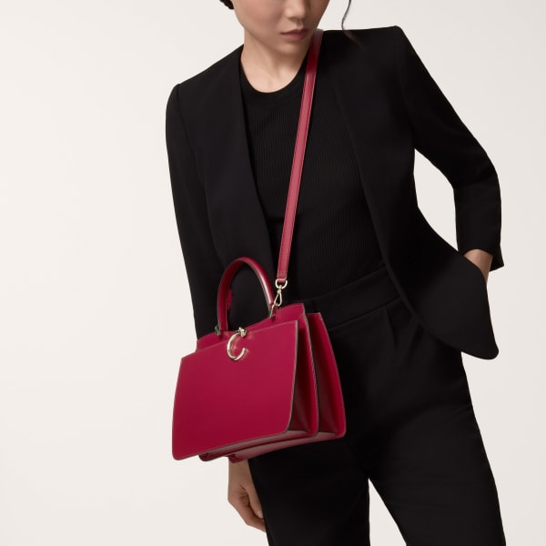 Top handle bag small model, Panthère de Cartier Cherry red calfskin, golden finish