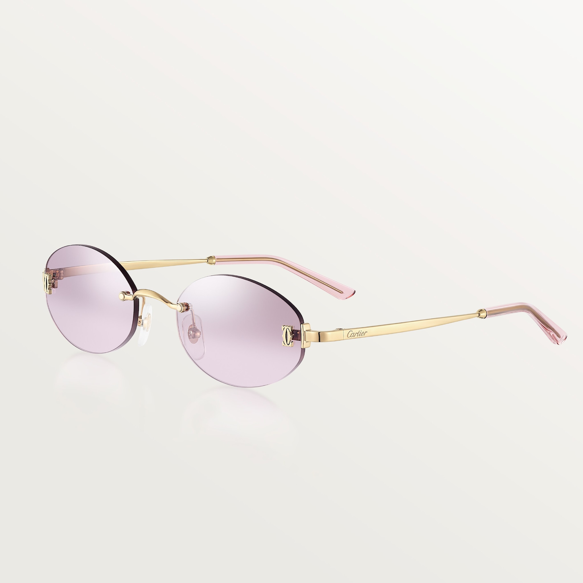 C de Cartier SunglassesSmooth golden-finish metal, light pink lenses