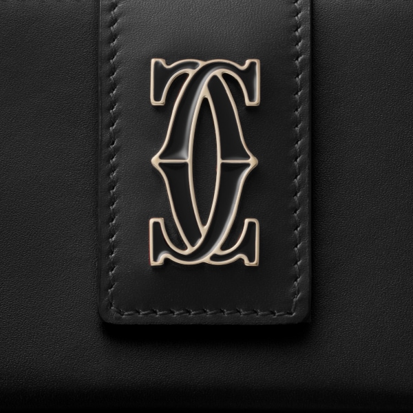 C de Cartier系列风琴式卡片夹 黑色小牛皮，镀金饰面，黑色珐琅