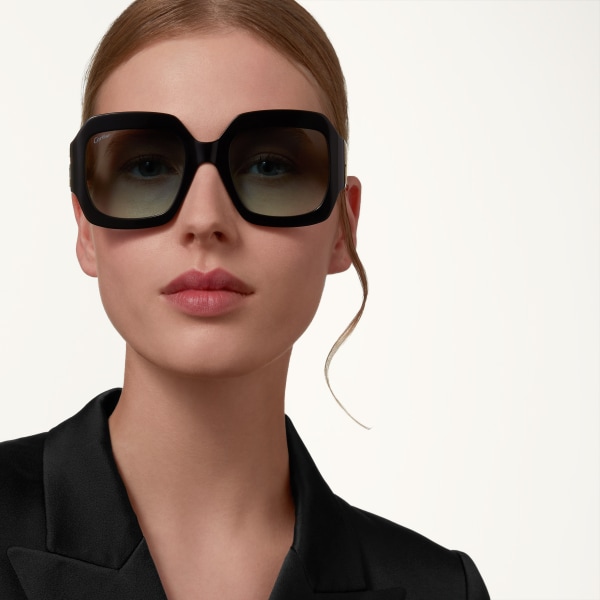 C de Cartier Sunglasses Black acetate, graduated green lenses