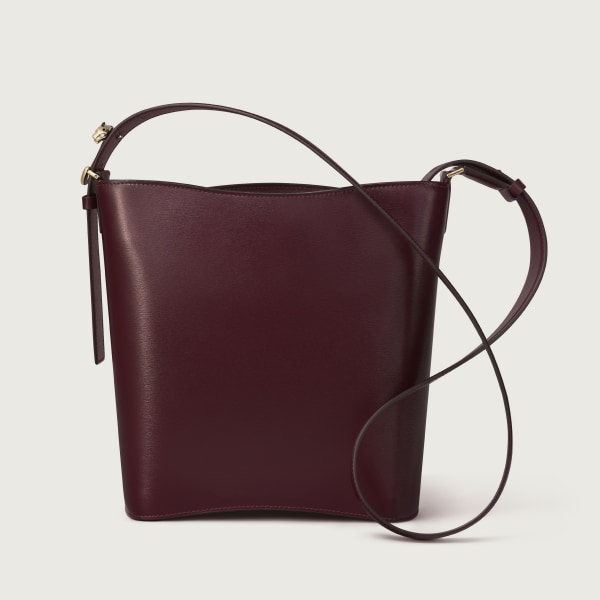 Small model bucket bag, Panthère C de Cartier Grape grained calfskin, golden finish