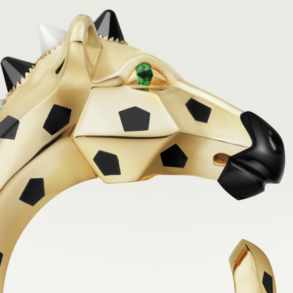 Indomptables de Cartier ring Yellow gold, black lacquer, onyx, moonstone, tsavorite garnet