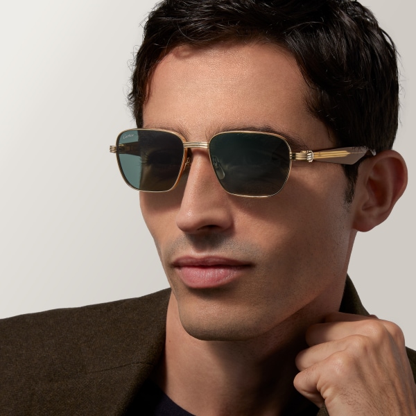 Première de Cartier Sunglasses Smooth golden-finish metal, transparent brown acetate, green lenses