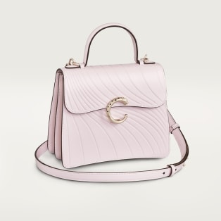 Top handle bag small model, Panthère de Cartier Petal pink calfskin, embossed Cartier signature motif, golden finish