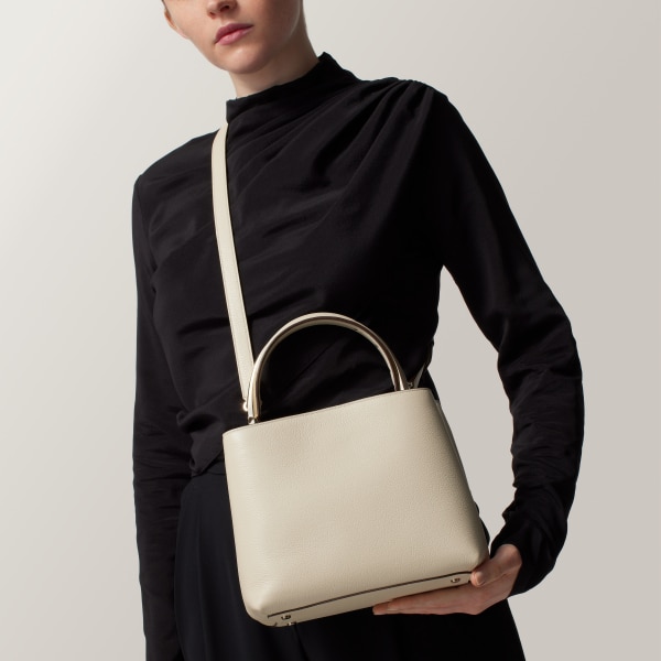 Small model handle bag, Panthère de Cartier Salt white calfskin, golden finish