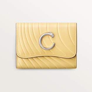 Mini wallet, Panthère C de Cartier Mimosa yellow calfskin, embossed with Cartier signature motif, palladium finish
