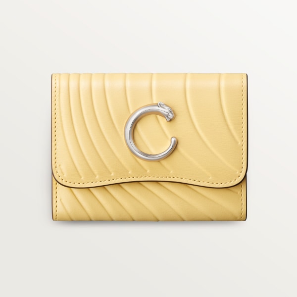 Mini wallet, Panthère C de Cartier Mimosa yellow calfskin, embossed with Cartier signature motif, palladium finish