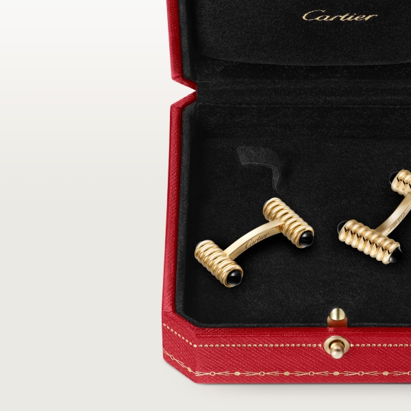 Cufflinks with spring motif Yellow gold, onyx