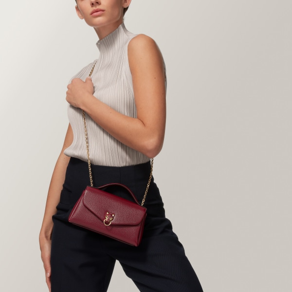 Nano model chain bag, Panthère Graphique de Cartier Burgundy grained calfskin, golden finish