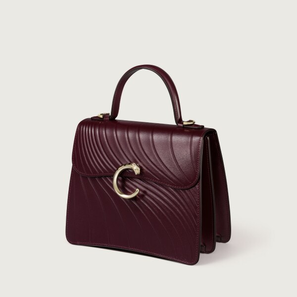Small model handle bag, Panthère C de Cartier Grape calfskin, embossed Cartier signature motif, golden finish