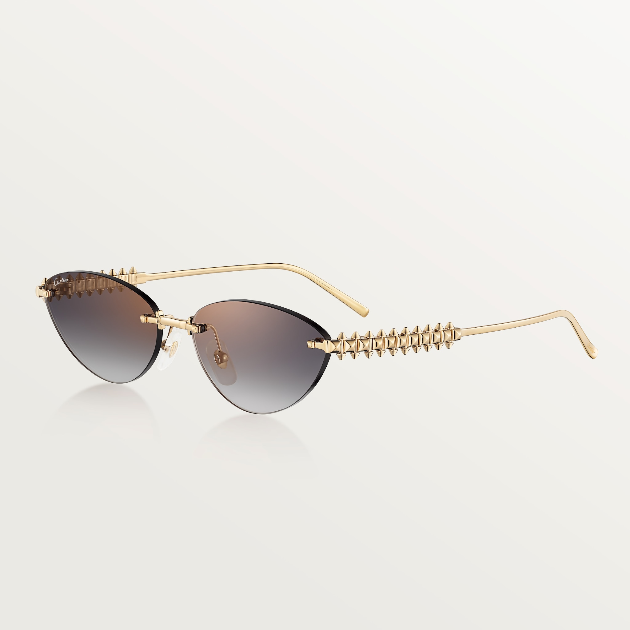 Clash de Cartier SunglassesSmooth golden-finish metal, grey lenses
