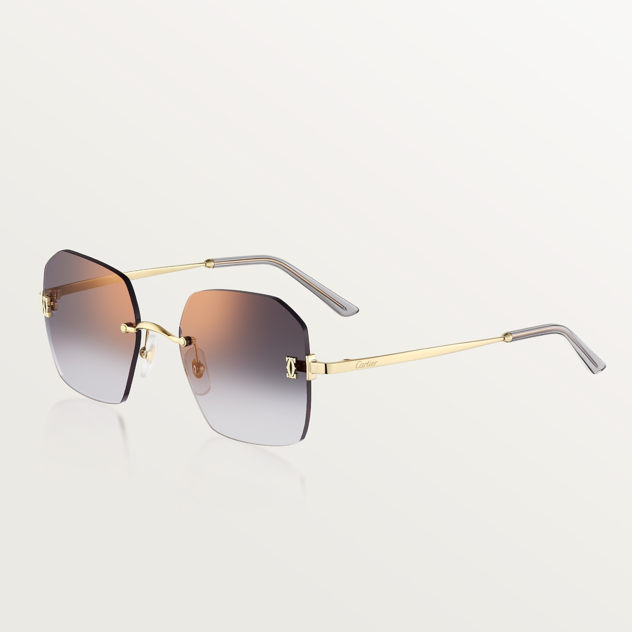 C de Cartier SunglassesSmooth golden-finish metal, grey lenses