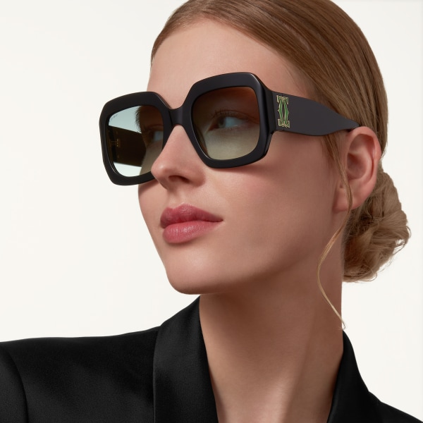 C de Cartier Sunglasses Black acetate, graduated green lenses