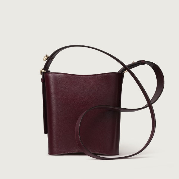 Mini model bucket bag, Panthère C de Cartier Grape grained calfskin, golden finish