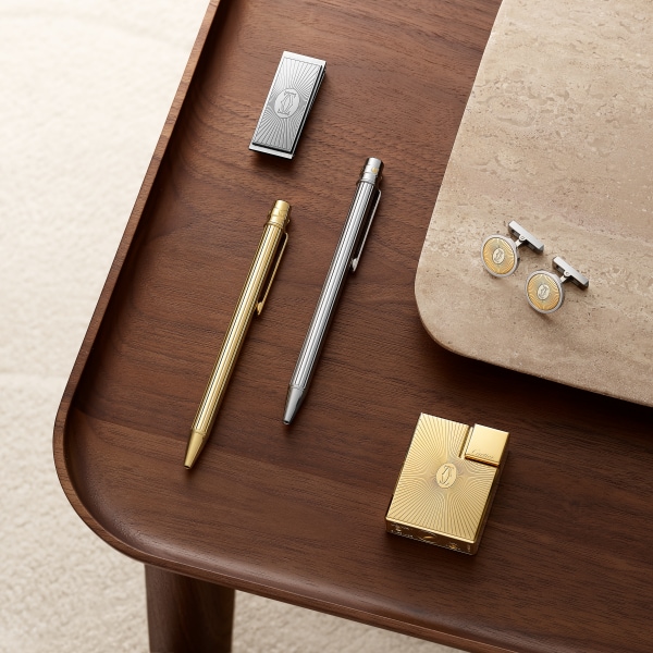 Double C de Cartier logo cufflinks with gold and silver Sunray motif Yellow gold, sterling silver, palladium finish