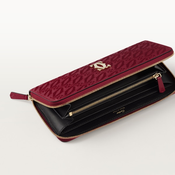 International zipped wallet, C de Cartier Cherry red textured calfskin, embroidery, golden finish
