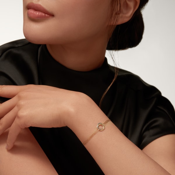 Trinity bracelet, on chain  White gold, yellow gold, rose gold