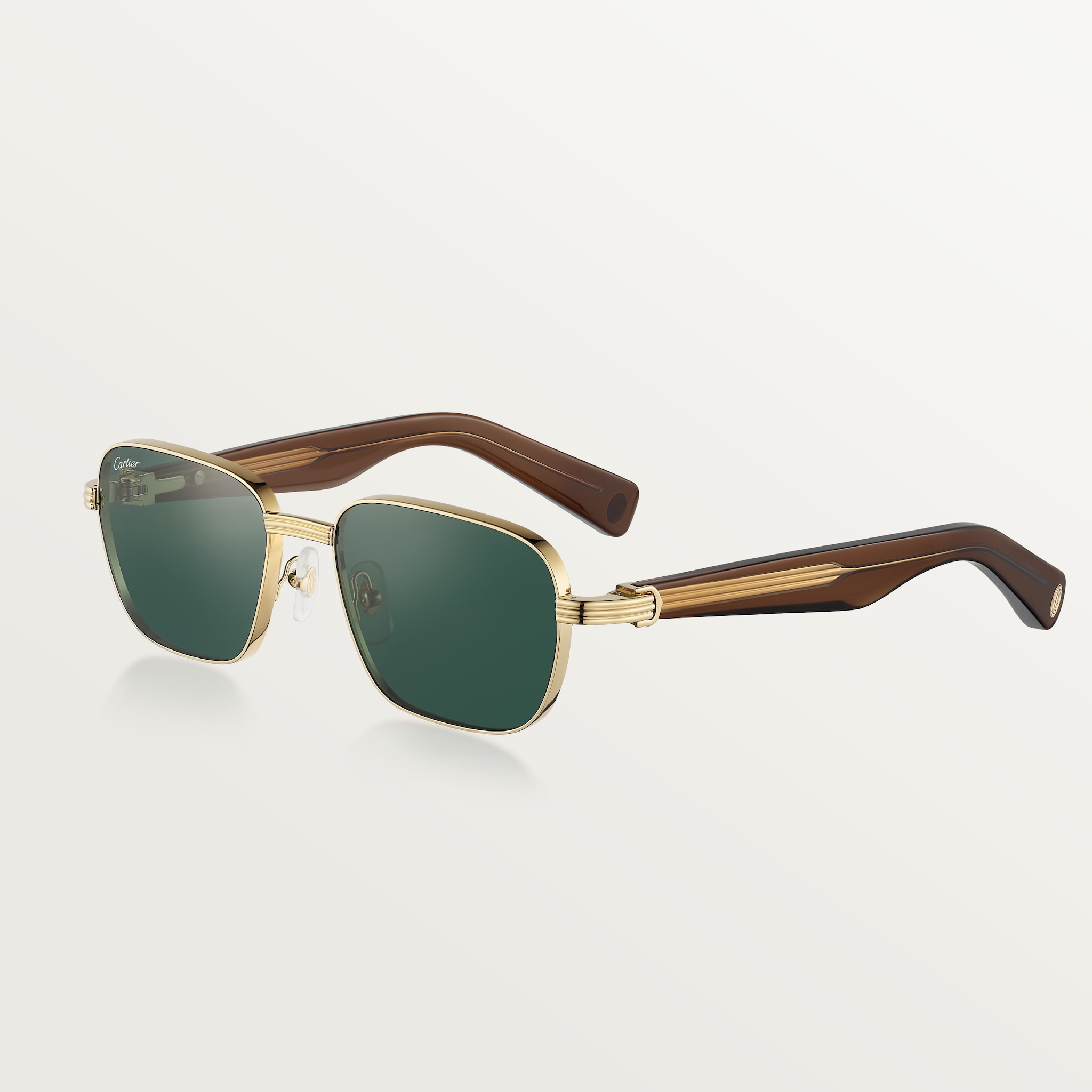 Première de Cartier SunglassesSmooth golden-finish metal, transparent brown acetate, green lenses