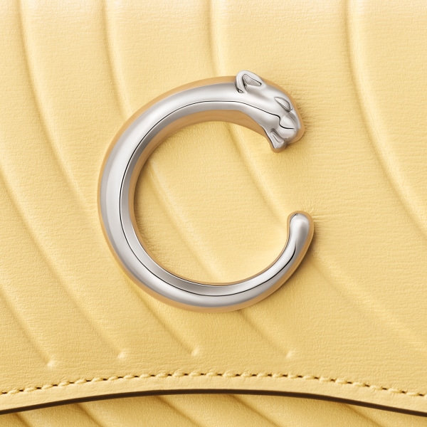 Mini wallet, Panthère C de Cartier Mimosa yellow calfskin, embossed with Cartier signature motif, palladium finish