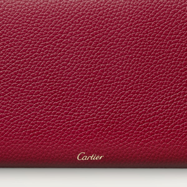 International wallet with flap, Panthère de Cartier Burgundy calfskin, golden finish and burgundy enamel