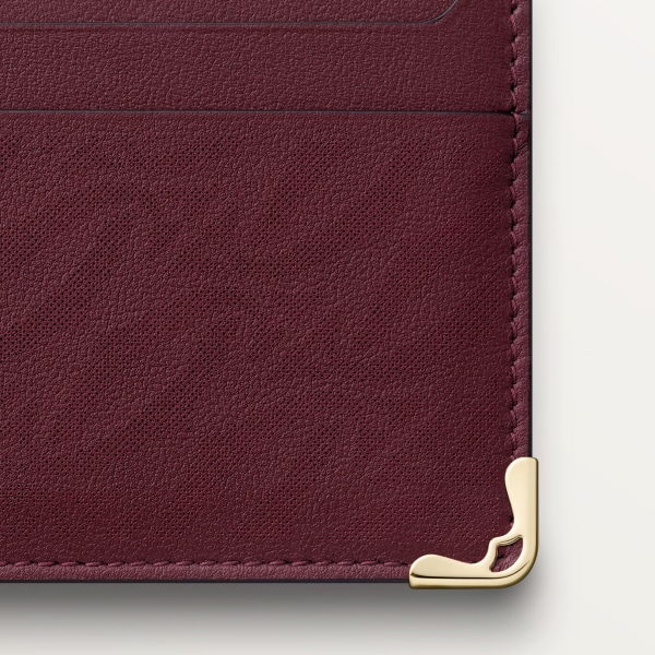 Double card holder, Must de Cartier Burgundy perforated logo calfskin, golden finish