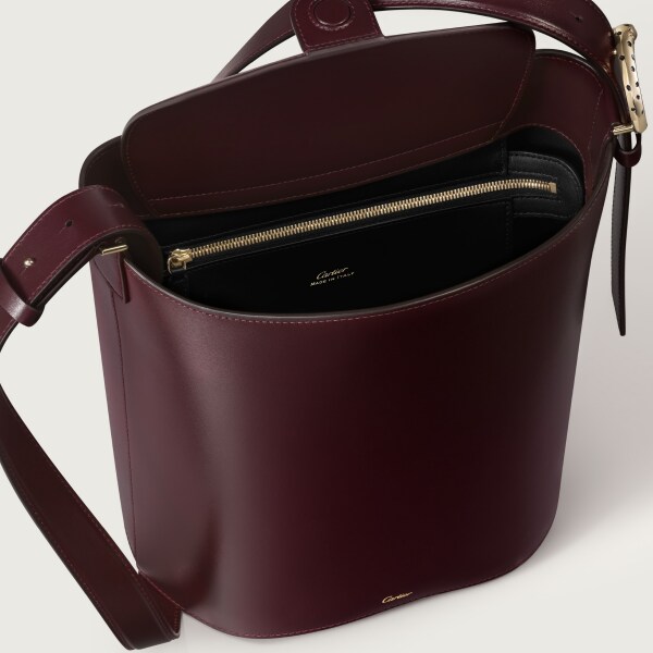 Small model bucket bag, Panthère C de Cartier Grape grained calfskin, golden finish
