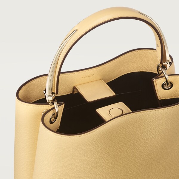 Small model handle bag, Panthère Double de Cartier Mimosa yellow calfskin, golden finish
