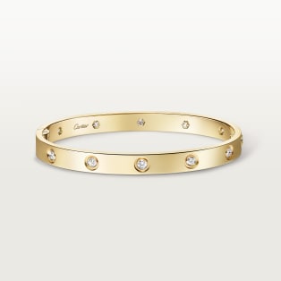 <span class='lovefont'>A </span> bracelet, classic model, 10 diamonds, one screw closure Yellow gold, diamonds