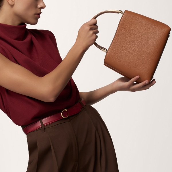 Top handle bag small model, Panthère de Cartier Handle bag, caramel grained calfskin, golden finish