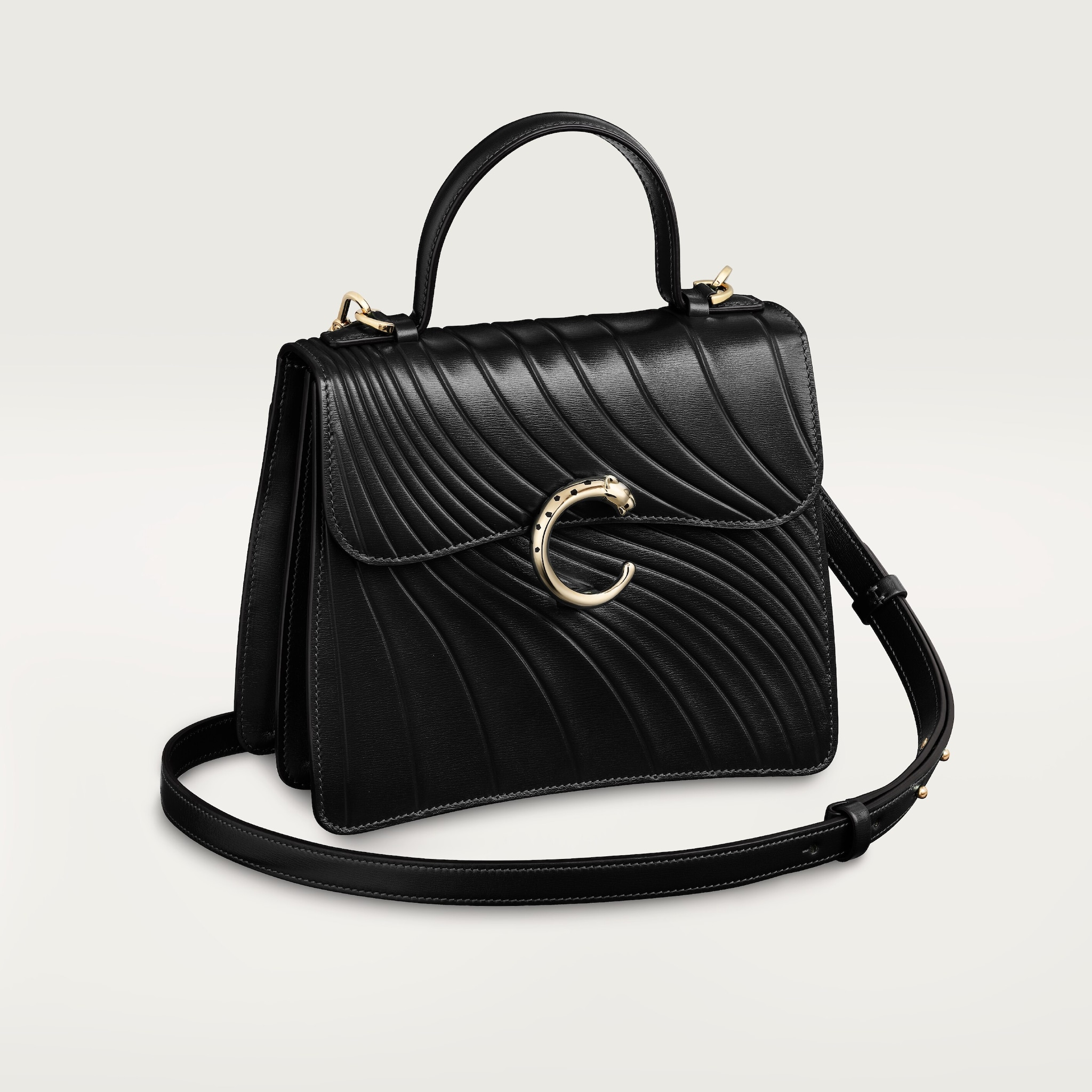 Handle bag mini model, Panthère de CartierBlack calfskin, embossed Cartier signature motif, golden finish